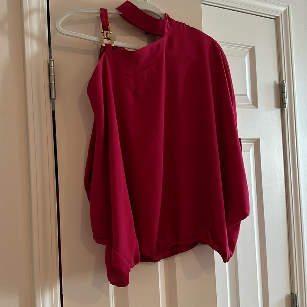 Beautiful wine color blouse off shoulder with gold buckle. New with tags medium